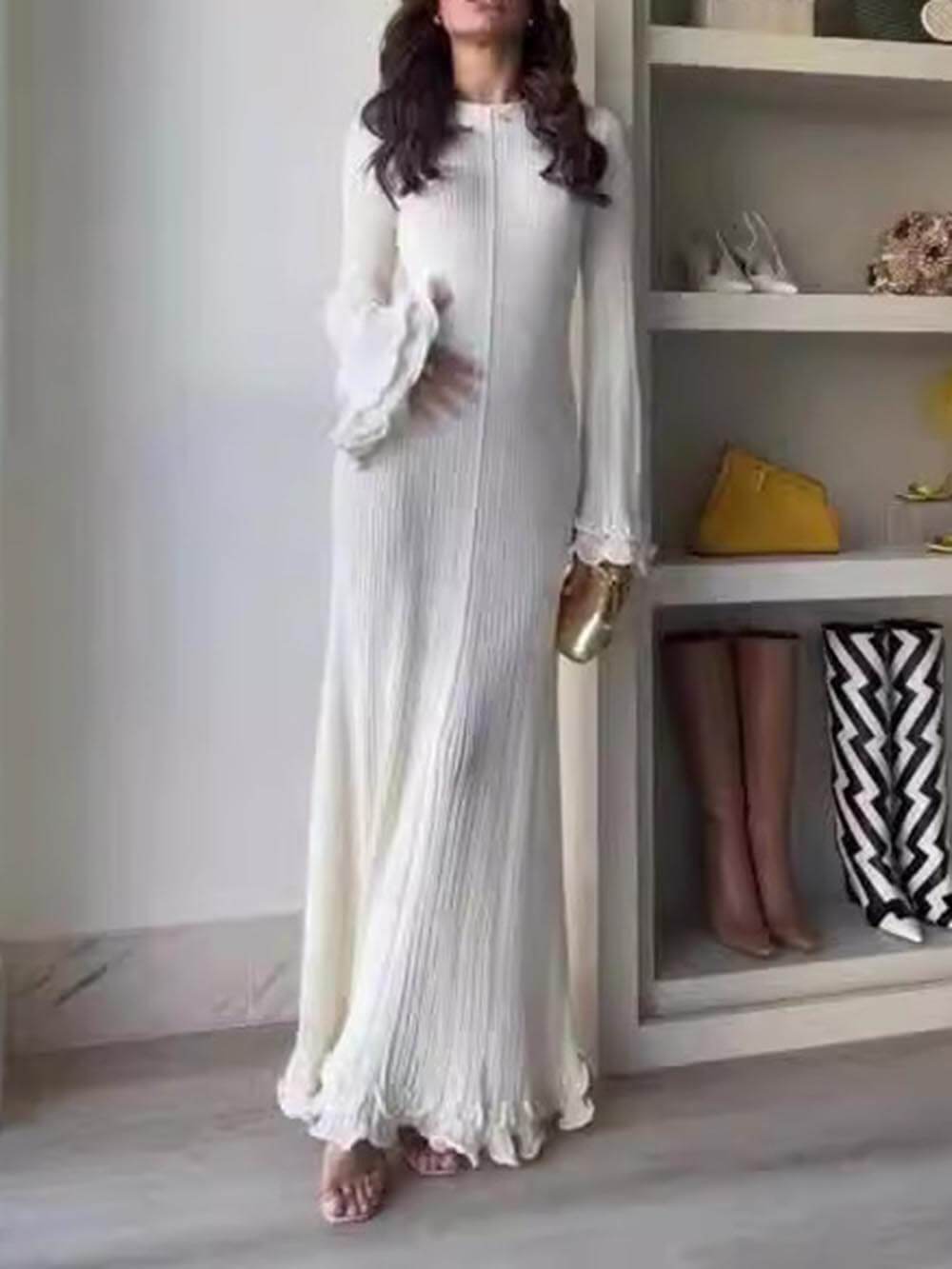 Robe maxi élégante à manches trompette, ourlet roulé et col rond en maille